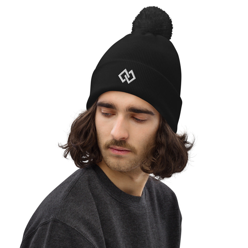 Double Diamond Pom-Pom Beanie in Black, worn